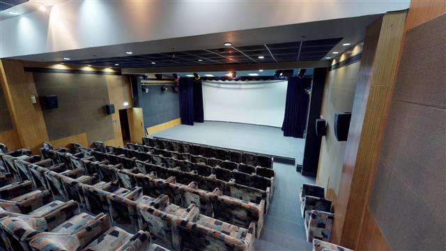 Digital Auditorium screen and stage at GM Rejoyz
